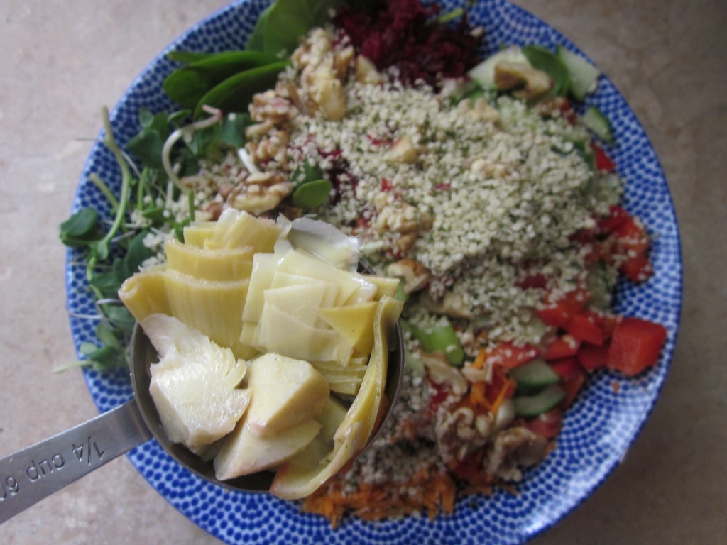 Goddess Layered Salad Recipe - add artichoke hearts