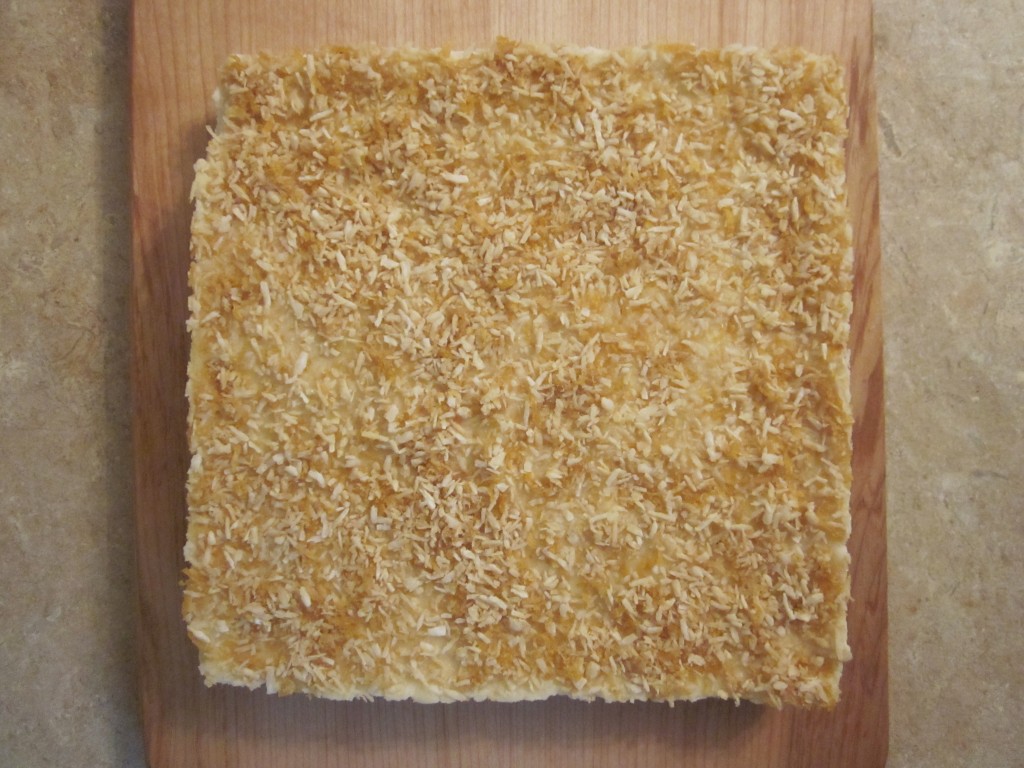 Luscious Vegan Lemon Squares Recipe -flipped over onto cutting board - ready to cut into squares