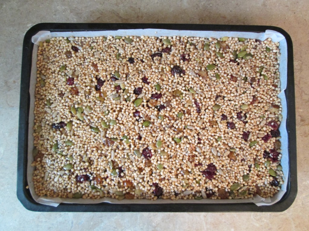 Puffed Quinoa Energy Bars Recipe - press mixture down in pan