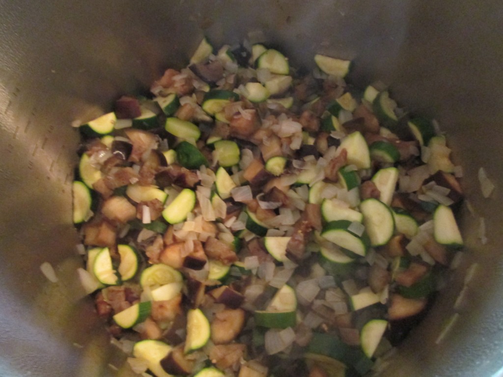 Zucchini Eggplant Green Curry Recipe with Quinoa - 5 onions, eggplant and zucchini sauteeing in pot